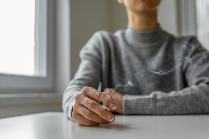 Woman smoking cigarette, Smoking During Addiction Recovery, Why Smoking is Bad for You, Should You Smoke During Rehab?,